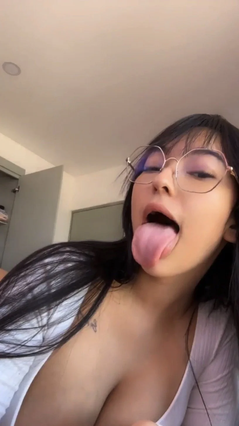 Thick juicy Latina teen with glasses doing ahegao and playing with her voluptuous body image 3