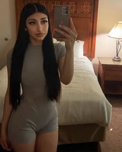 Petite Latina slut showing off her body cover image
