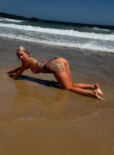 A wild blonde let loose in the beach cover image