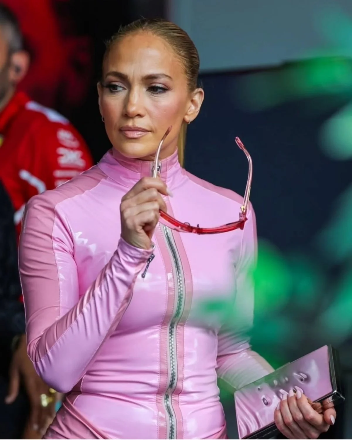 JLO in pink vinyl suit image 11