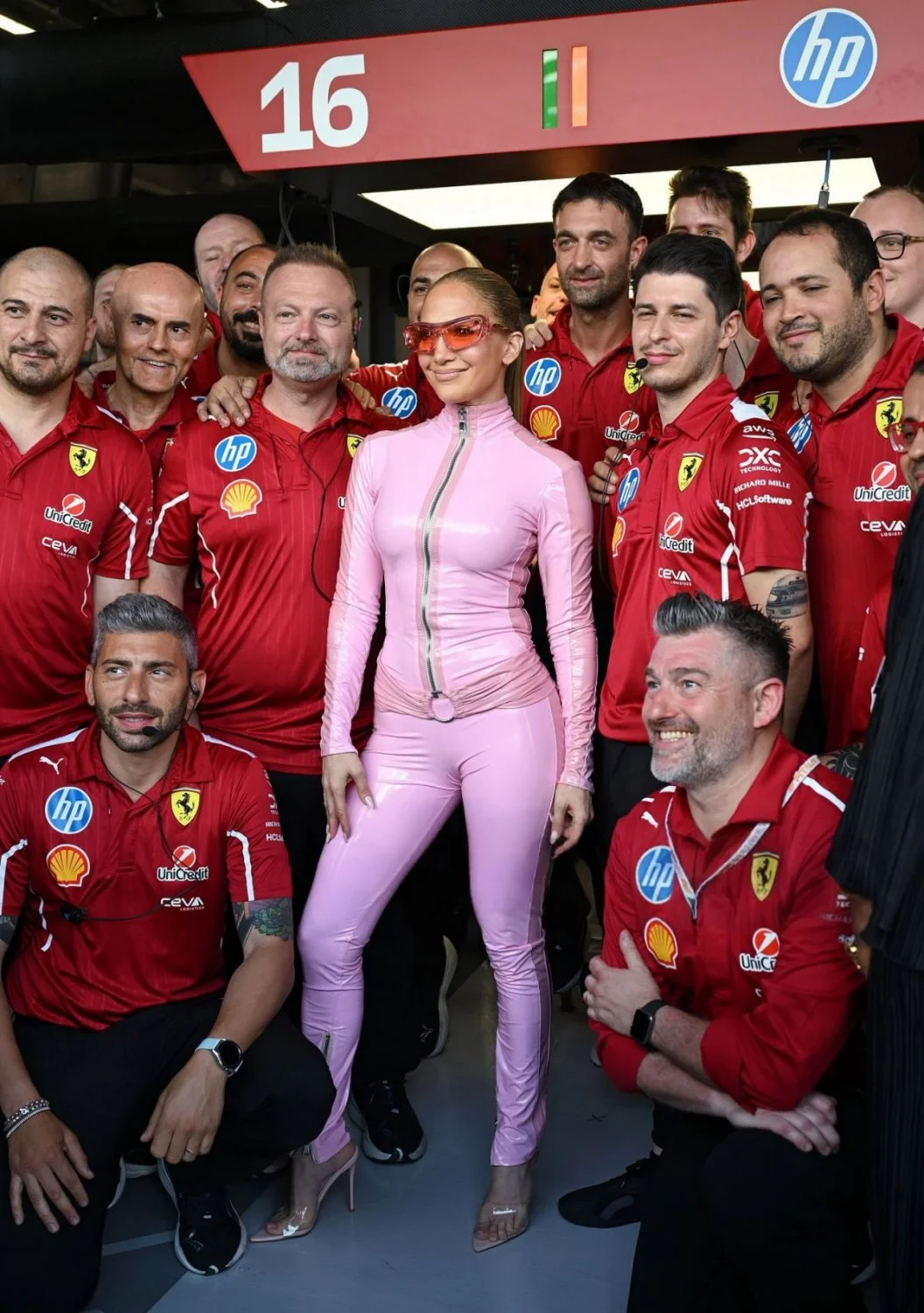 JLO in pink vinyl suit image 3