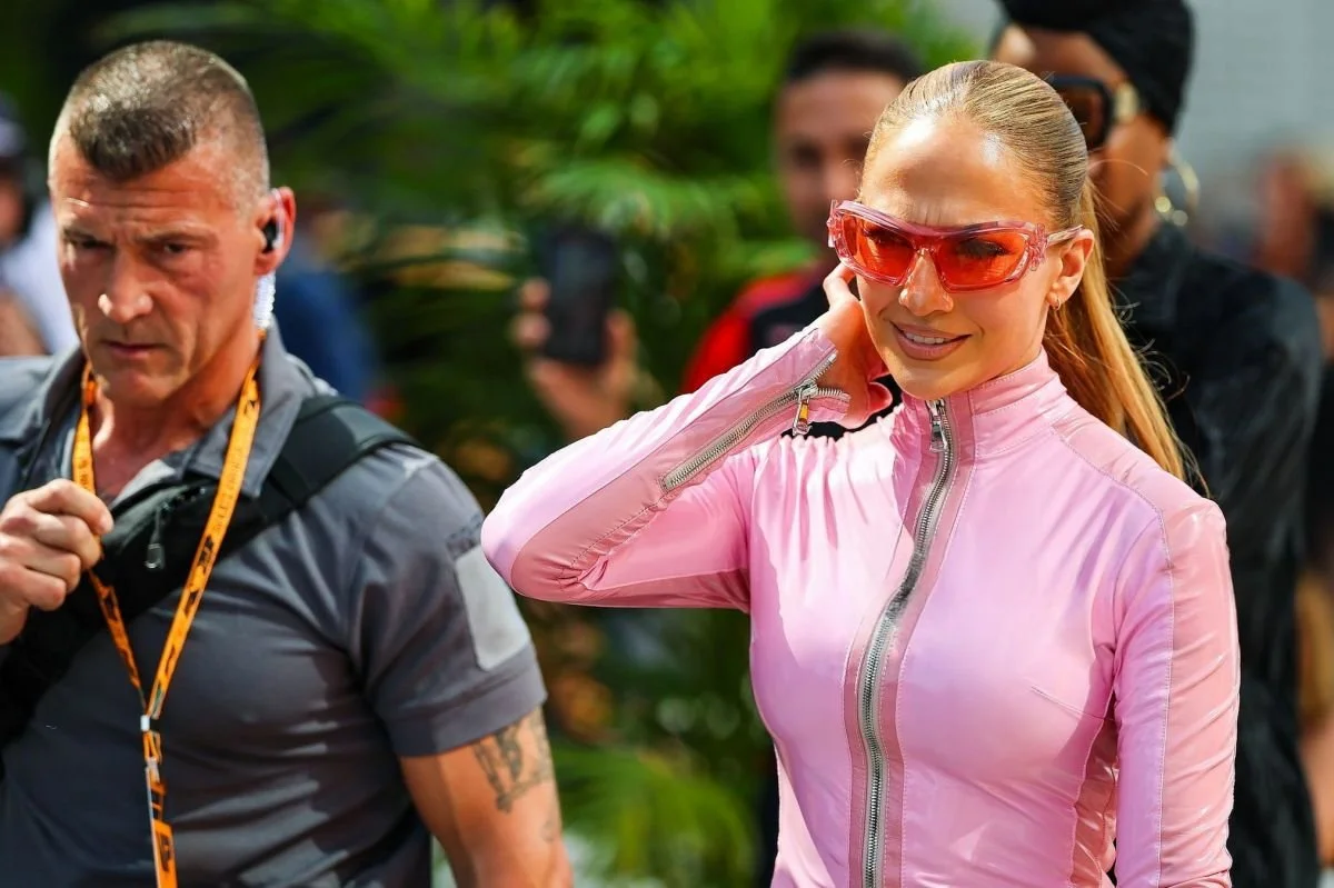 JLO in pink vinyl suit image 5