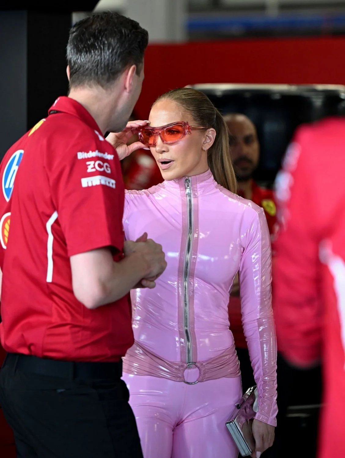 JLO in pink vinyl suit image 9