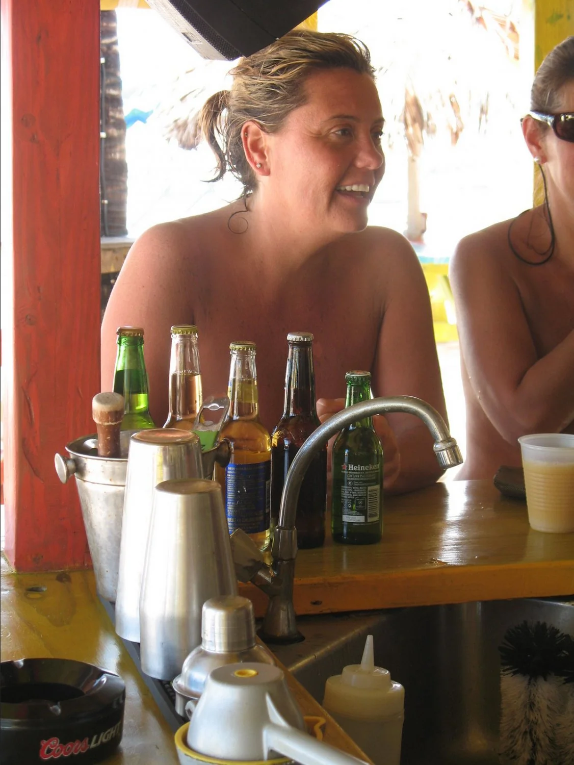 topless women drink for free image 3