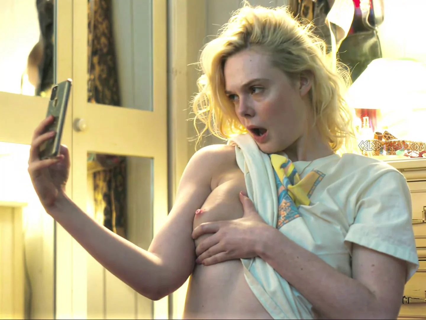 Elle Fanning shows her tits in new movie 😮😍 image 2