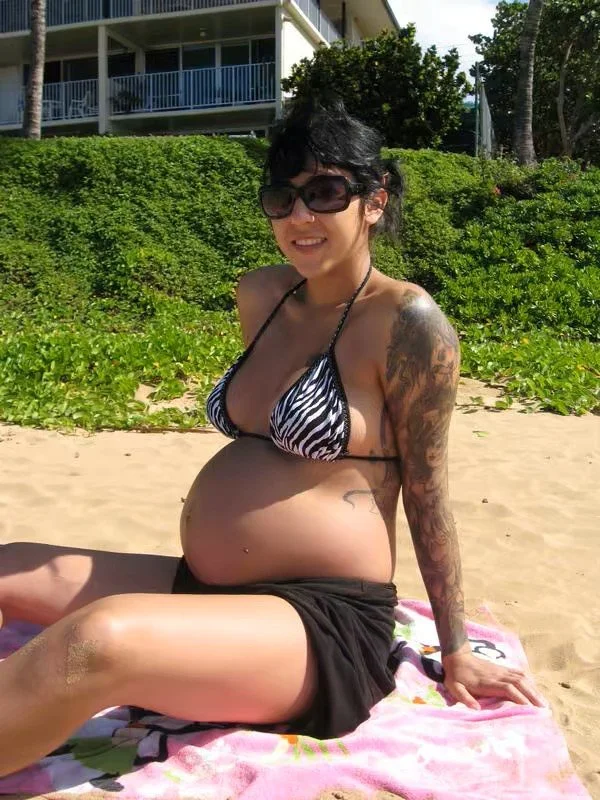pregnant slut Nancy plays with her wet pussy image 6