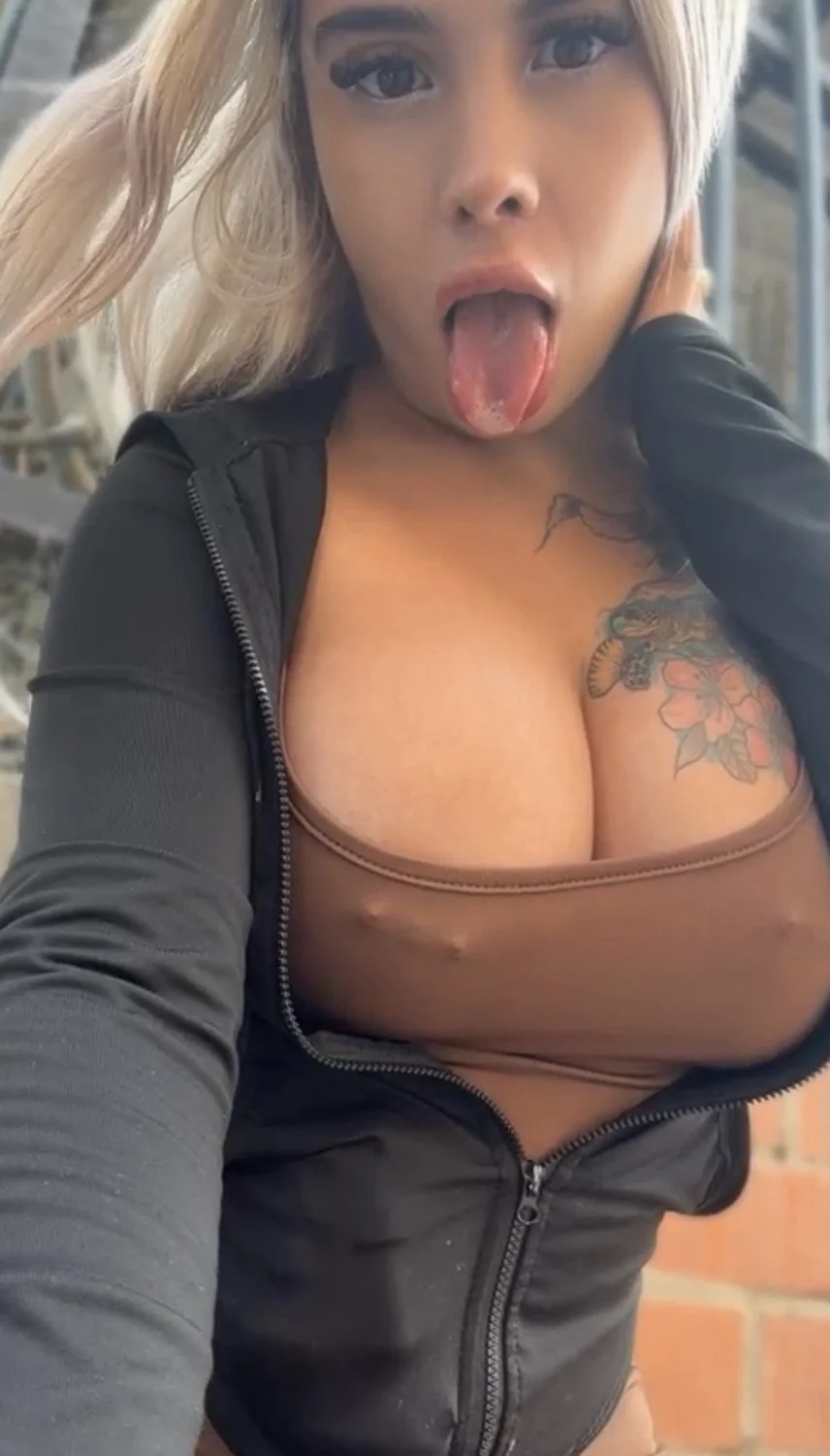 Big titis girl in the street image 12