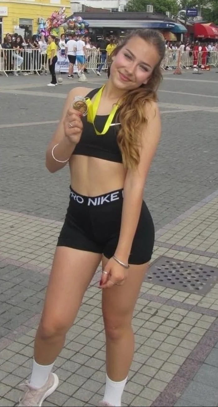 Sexy fit girl teasing image 2