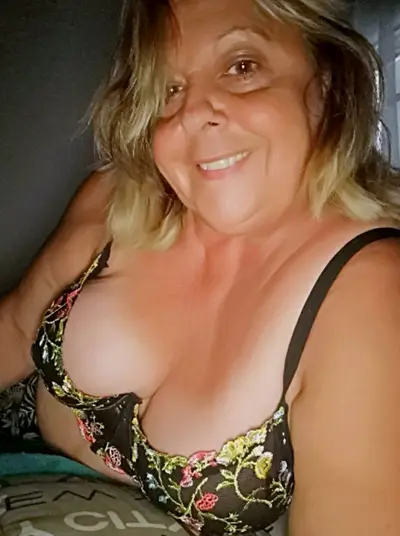 When my neighbor's husband goes fishing, she sends me photos of herself acting like a slut. cover image