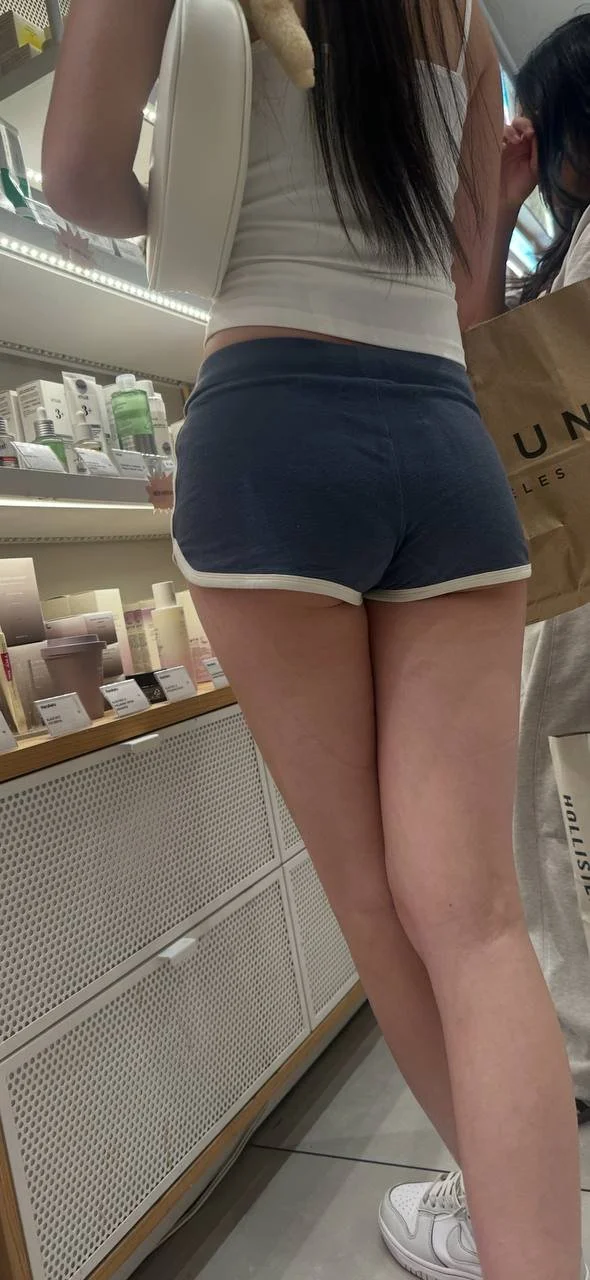 Creeping on asian teen in mini short part2 image 7
