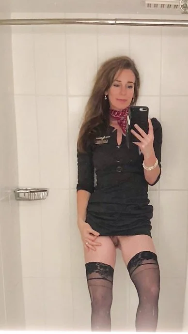 Hot MILF Flight Attendant ans Whore image 1