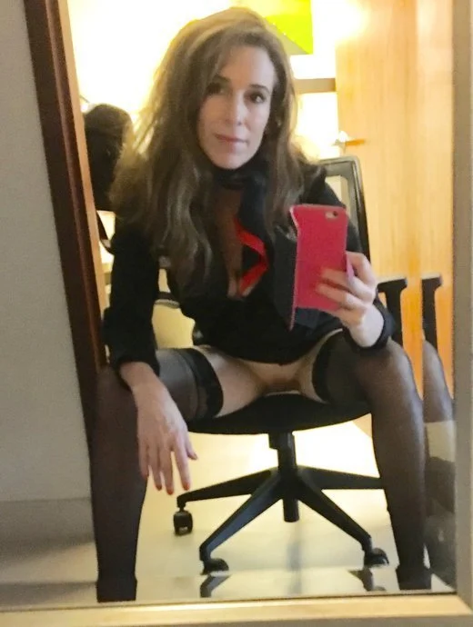 Hot MILF Flight Attendant ans Whore image 5