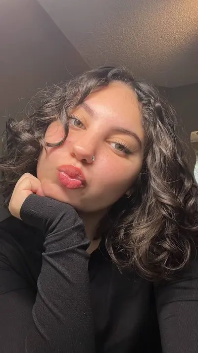 Curly head cutie with a perfect ass cover image