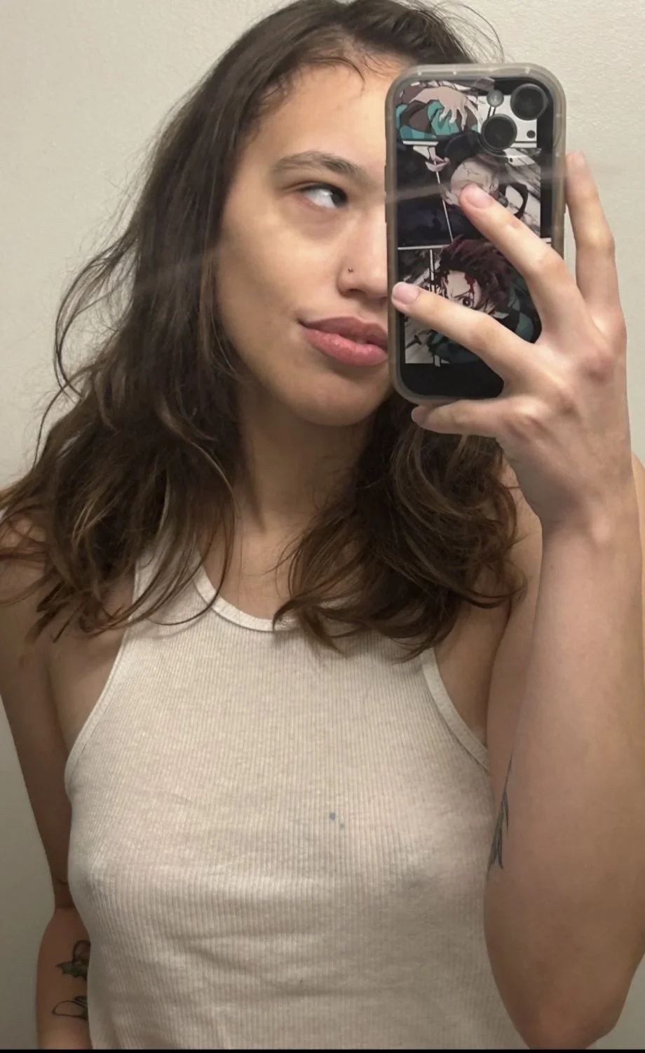 Petite Latina hard nipples image 1