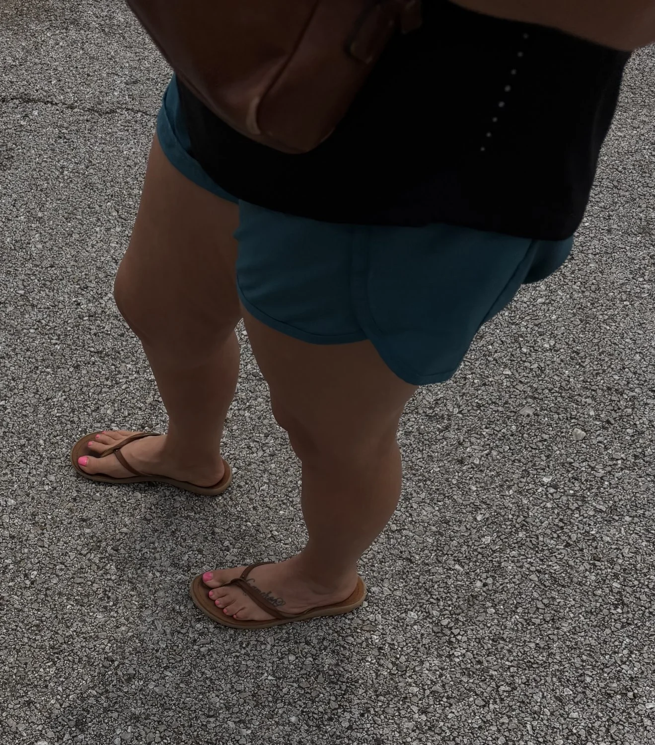 Woman’s feet in sandals main image