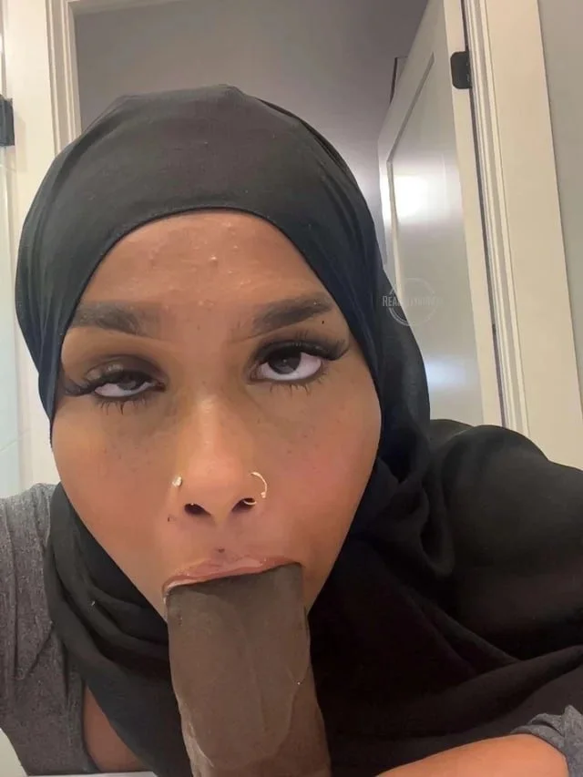 Somali chick deepthroating a dildo image 3