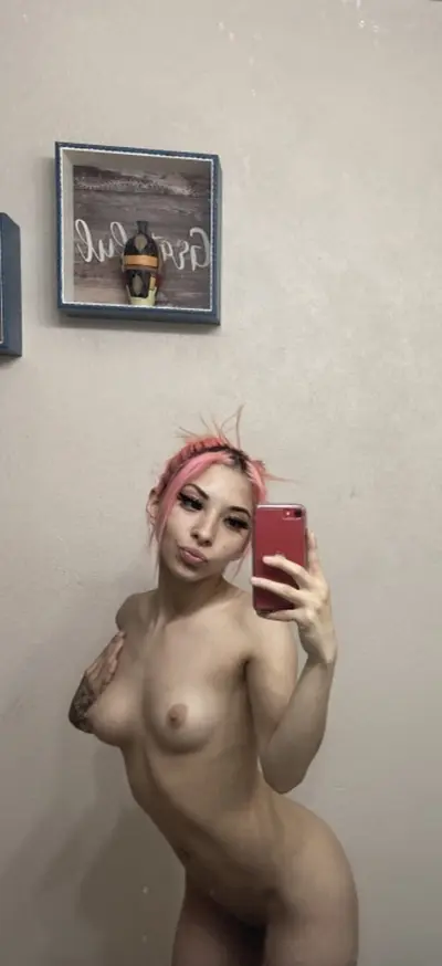 Pink hair slut spreads her Latina pussy cover image