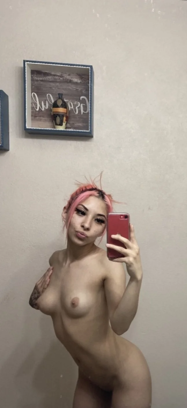 Pink hair slut spreads her Latina pussy main image