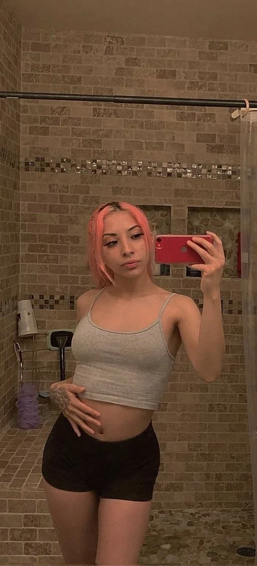 Pink hair slut spreads her Latina pussy image 2