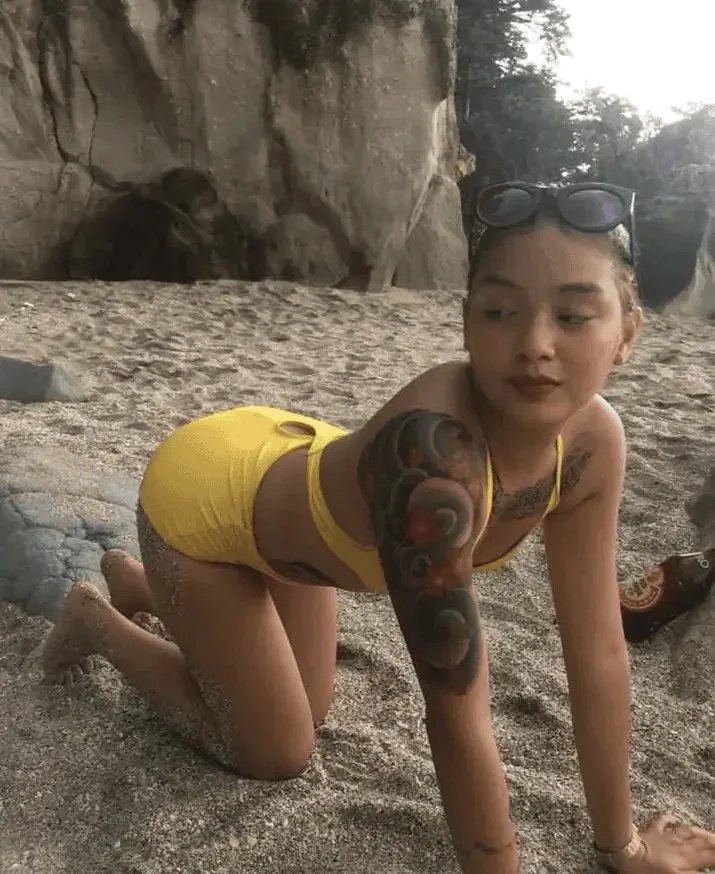 Tatted Asian shower masturbation solo image 4