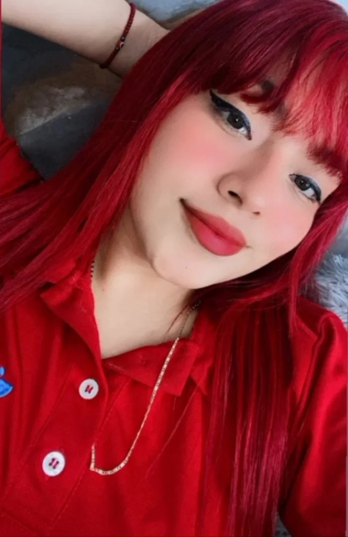 Putita peliroja de ojos rasgados buen cuerpo y sexy image 14