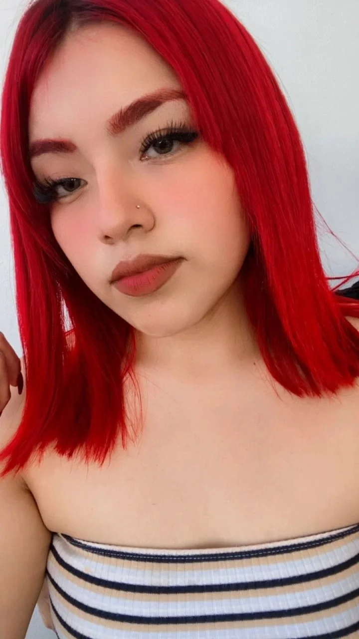 Putita peliroja de ojos rasgados buen cuerpo y sexy image 9
