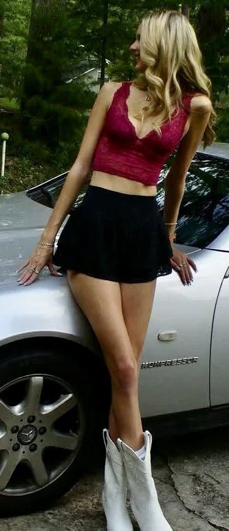 Blonde bombshell is a tall and thin IRL baddie image 19
