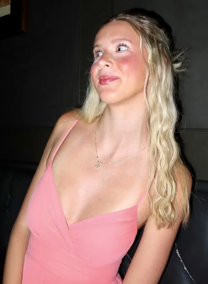 Blonde bombshell is a tall and thin IRL baddie image 9