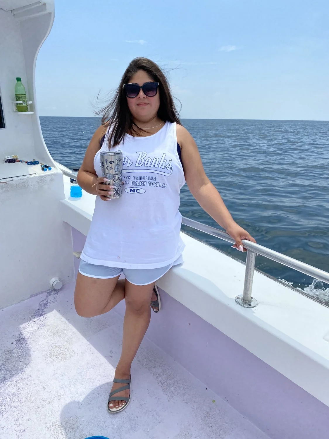 I let the deck hand blast his load on my wifes face for helping us haul in a huge fish main image