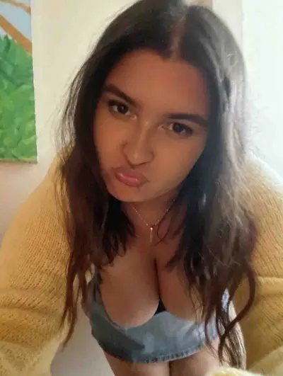 Sexy cute slut loves showing off her big tits cover image