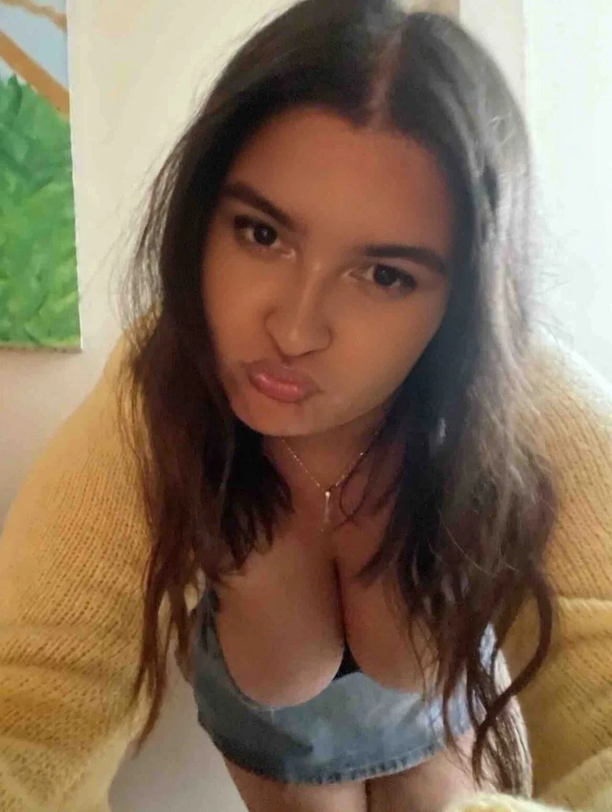 Sexy cute slut loves showing off her big tits main image