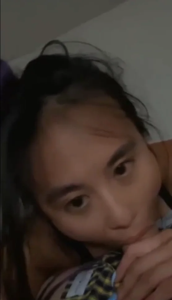 Cute asian teen giving blowjob main image
