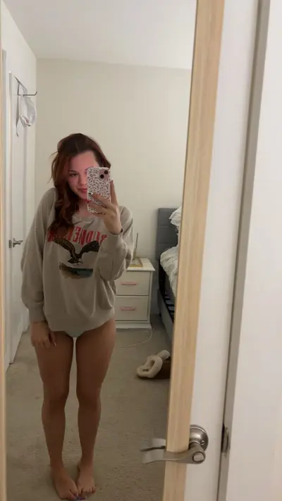 Barely legal redhead teen with a fat ass cover image