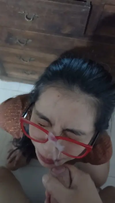 latina with glasses swallows cum cover image