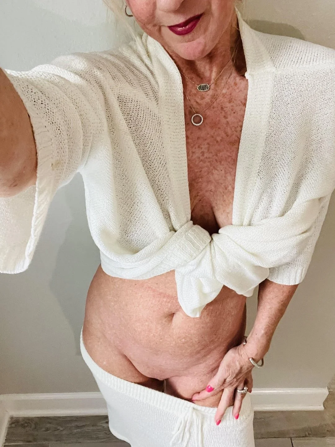 Sexy freckled GILF image 23