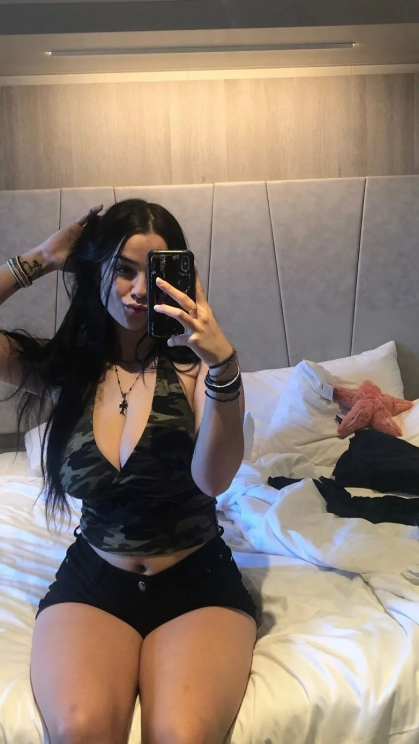 Busty Latina slut Megan loves showing off her big tits image 32