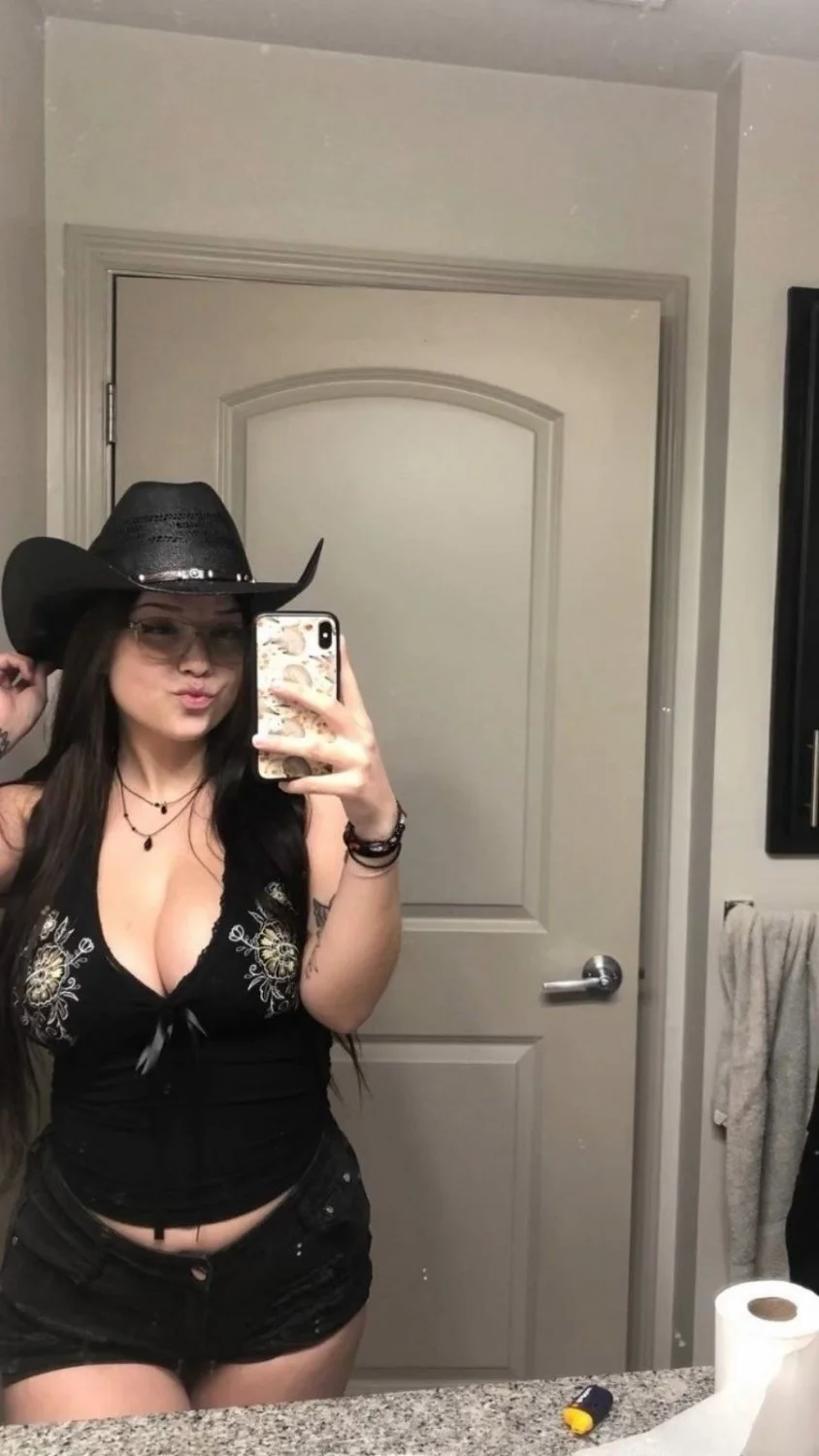 Busty Latina slut Megan loves showing off her big tits image 5