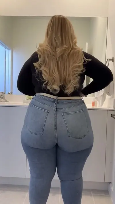 Blonde with big ass in jeans cover image