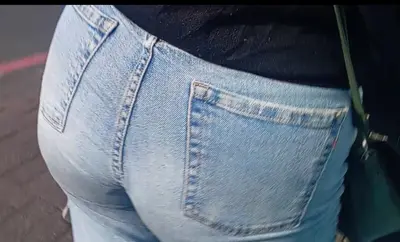 Woman in public - perfect ass jeans cover image