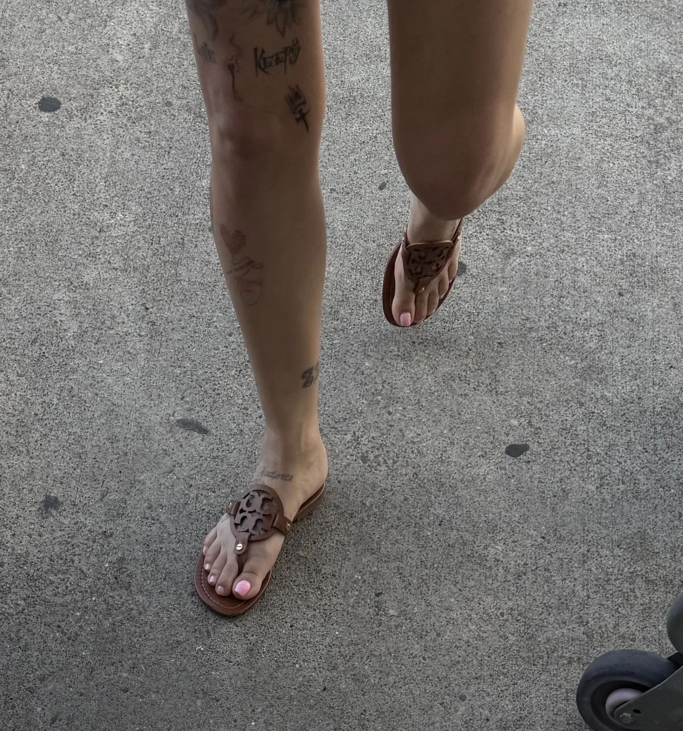 Woman’s feet in sandals (she steps on my spit) image 1