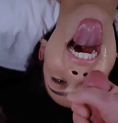 Cute asian teen gets her mouth fucked and covered in cum cover image