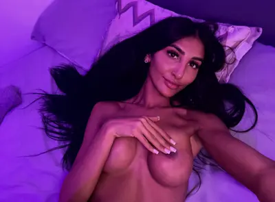 What do you think is softer? Me or the bed cover image