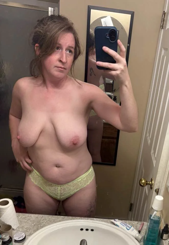 Big tit whore takes nude selfies main image