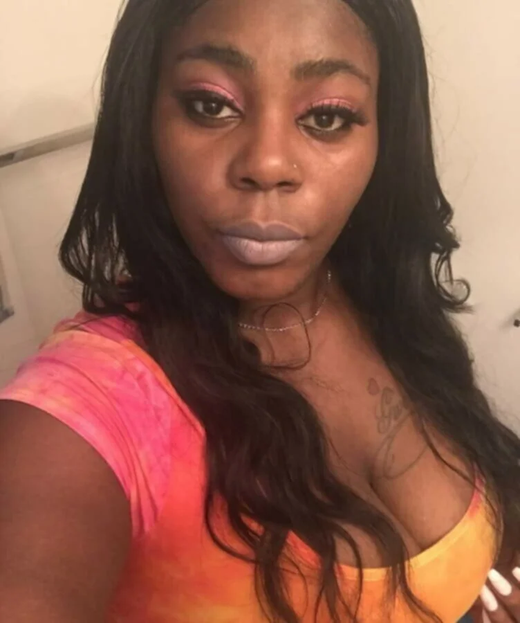 Ebony shows her pink phat pussy and large breasts image 2