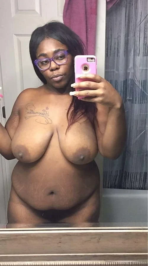 Ebony shows her pink phat pussy and large breasts image 6