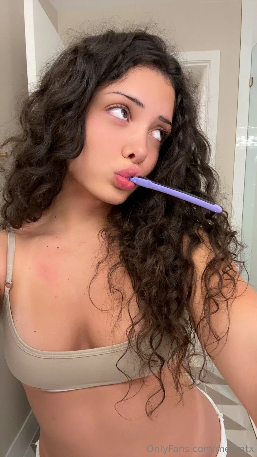 thick albanian MELI M brushes her teeth while shaking ass image 2