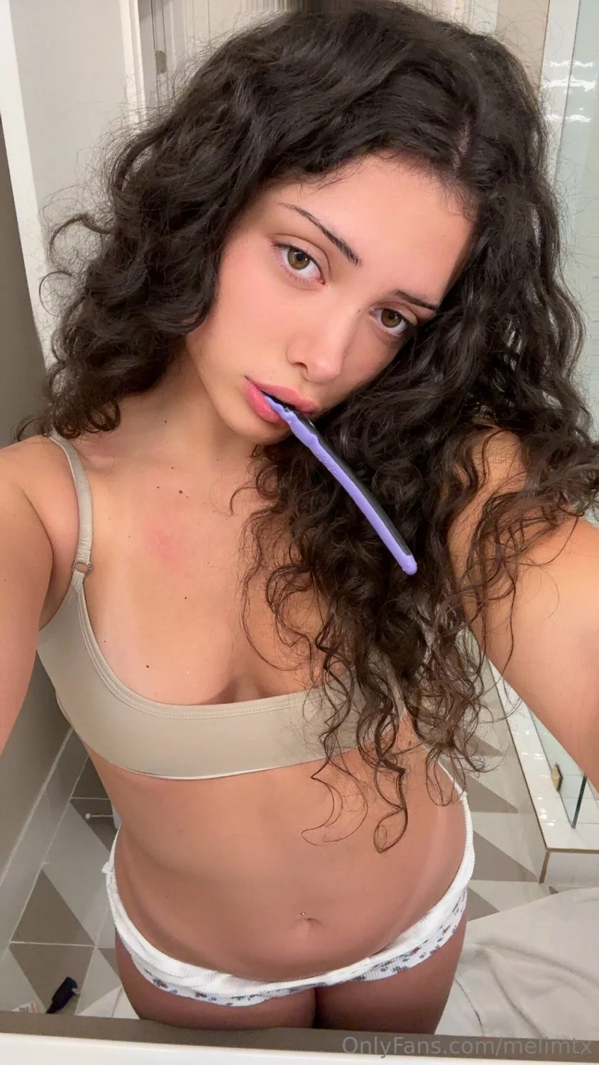 thick albanian MELI M brushes her teeth while shaking ass image 3