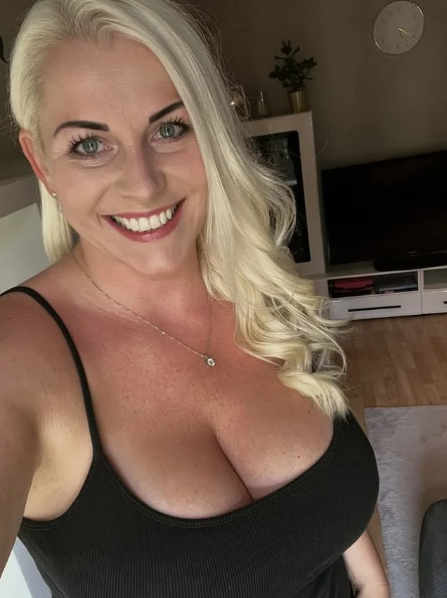 Blonde Pawg milf has a beautiful cumface image 3