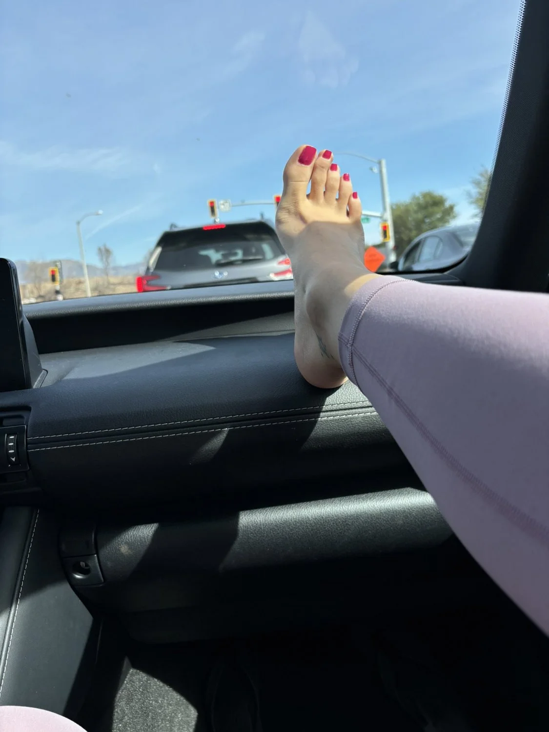Sexy petite girl showing her toes and soles image 8