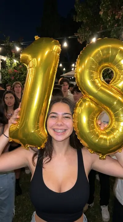 Teen with braces showing her small boobs cover image